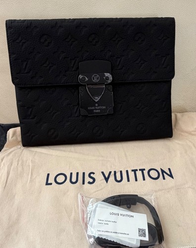 Louis vuitton lock clutch - louis,